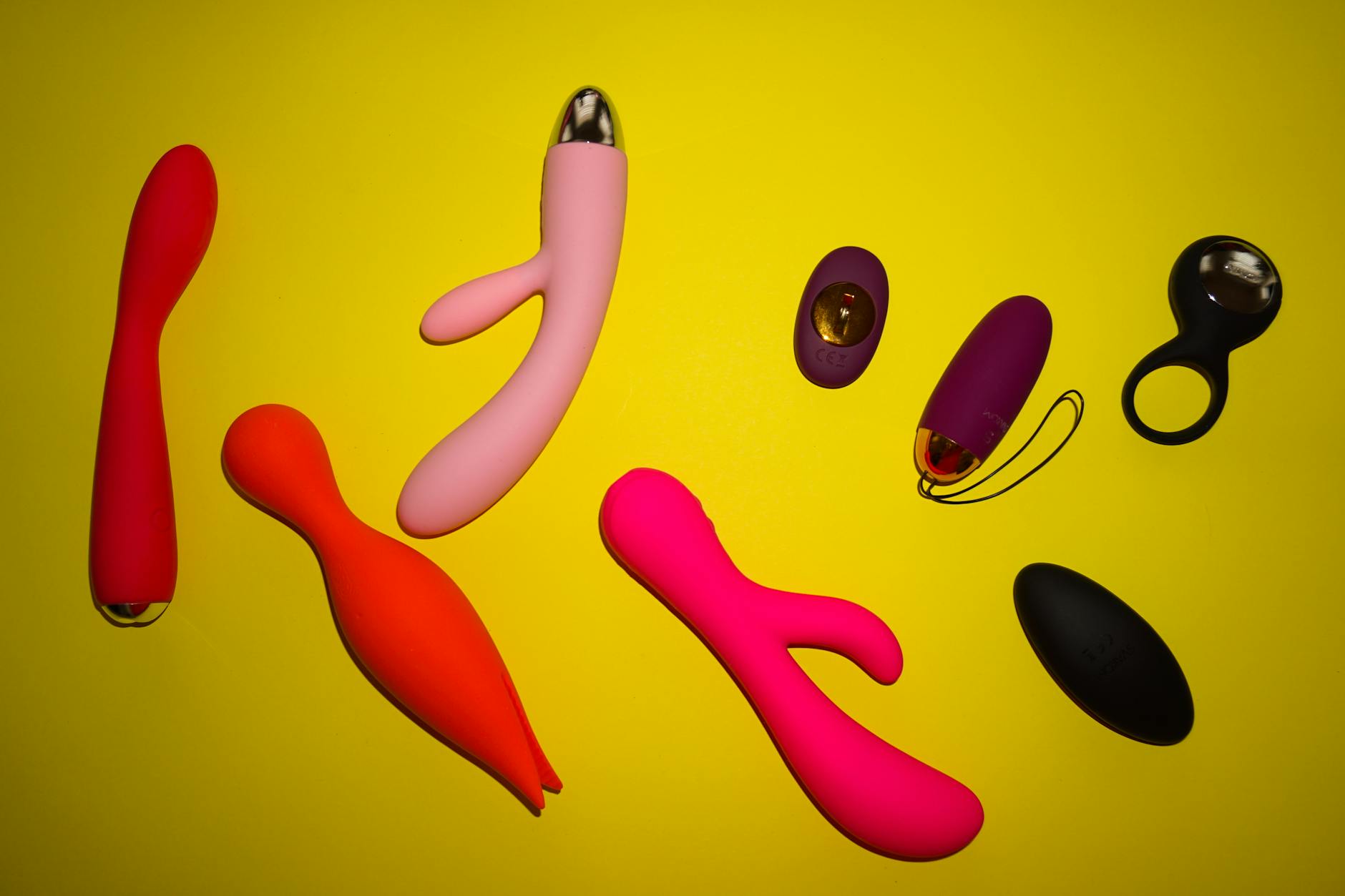 Fresh lemons on a bright pastel background, representing the Lem vibrator's citrus-inspired design